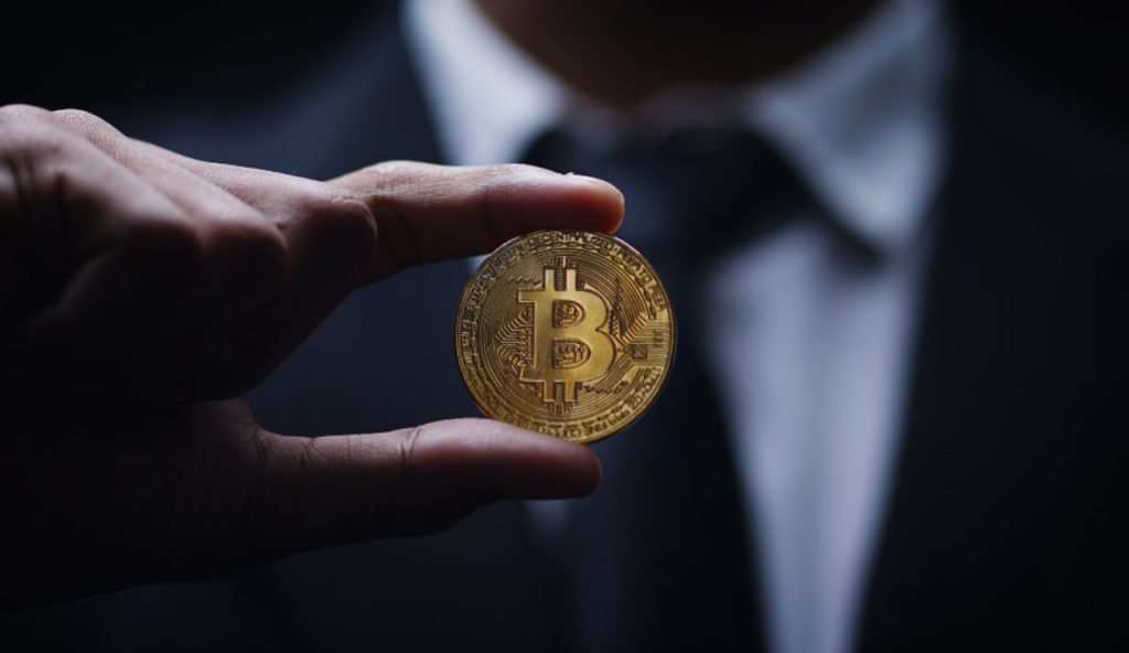 Illustrazione di una "moneta" bitcoin (Canva FOTO) - financecue.it
